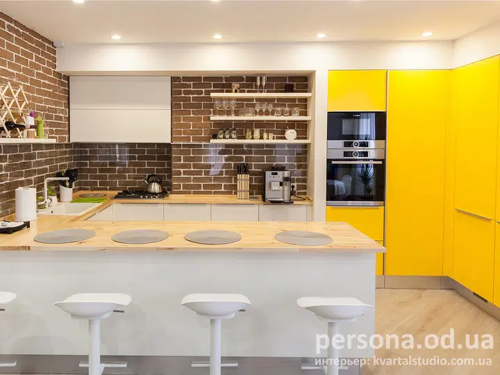 Studio kitchen with exposed brickwork