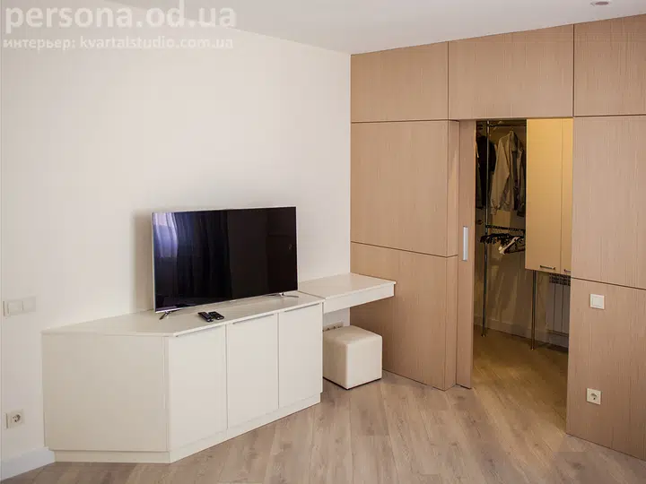 Bedroom with a veneered partition