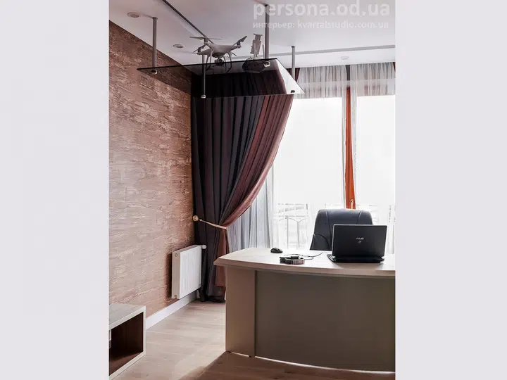 Home study with a display cabinet up to the ceiling