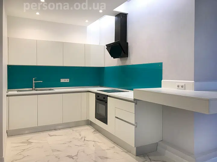 White kitchen with a bright work wall