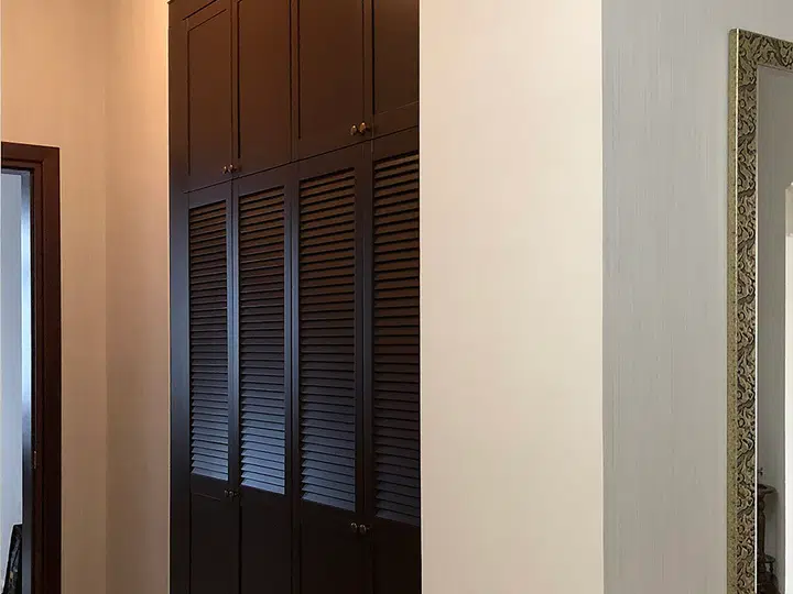 Wardrobe with louvred doors
