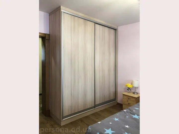 Restrained, minimal bedroom wardrobe