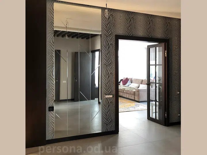 Large wall mirror in a hallway