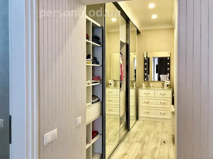 Large sliding wardrobe in a hallway