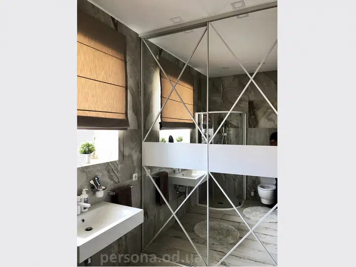 Sliding wardrobe with a sandblasted mirror