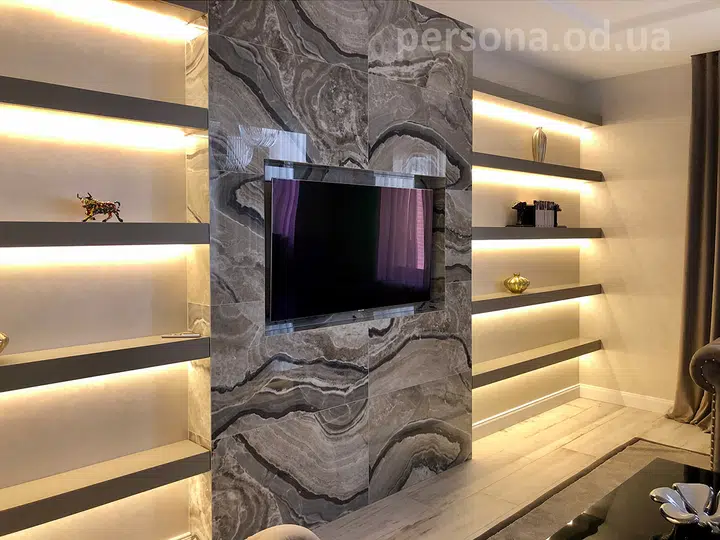 Full-wall shelving with lighting