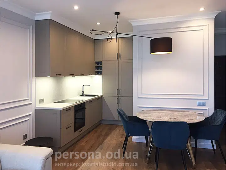 Corner kitchen with a built-in fridge