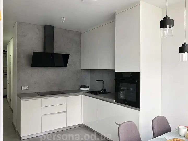 Corner kitchen with a tall unit
