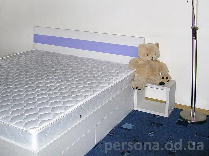Bed with four pull-out drawers