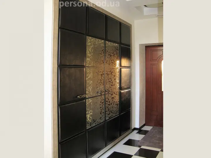 Framed wardrobe with leather inserts