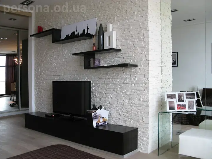Living room with an aluminium plinth