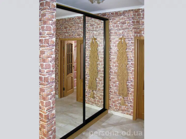 Mirrored wardrobe in a hallway