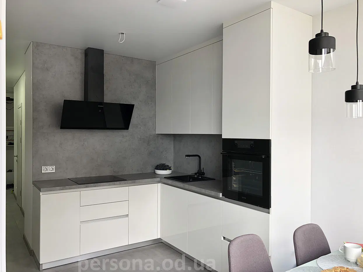 Corner kitchen with a tall unit