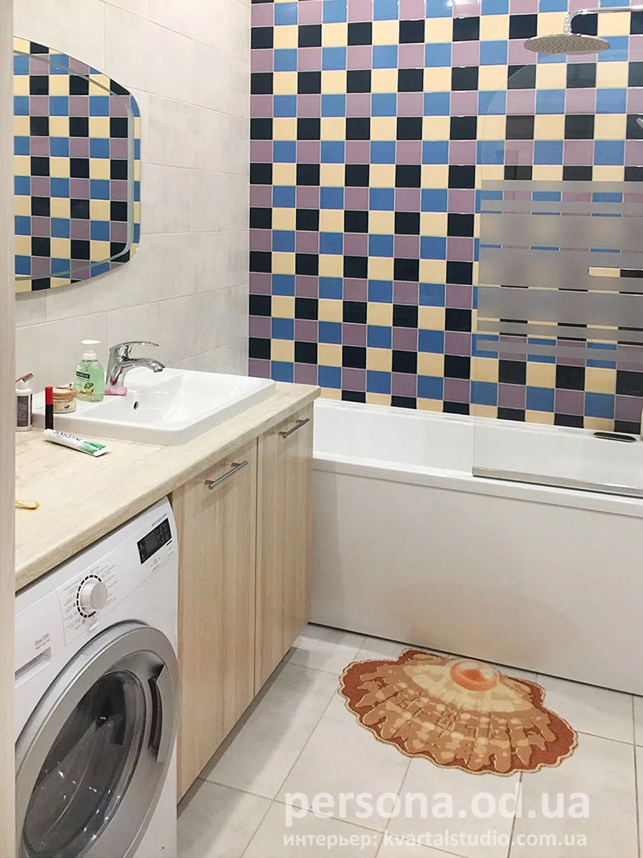 Vanity unit for a basin and washing machine