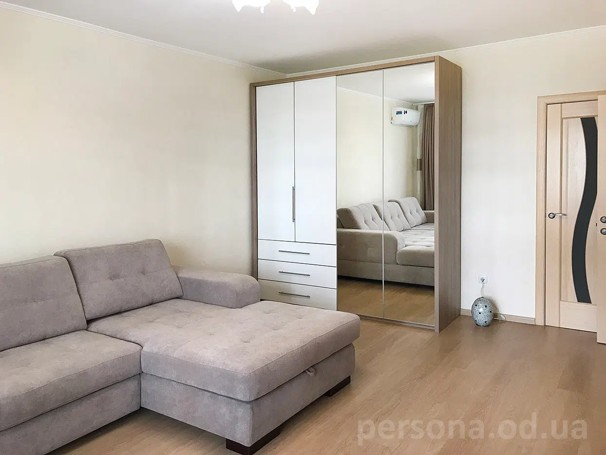 Bi-fold wardrobe with a mirror