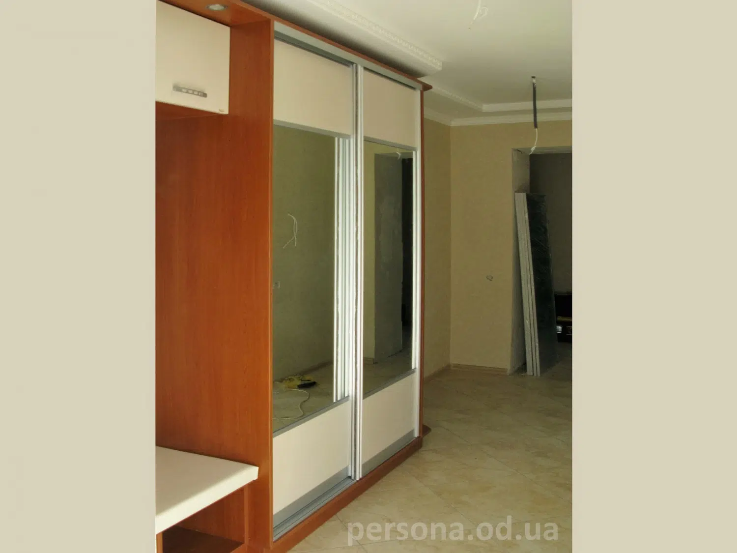 Hallway wardrobe with a seat and coat rack