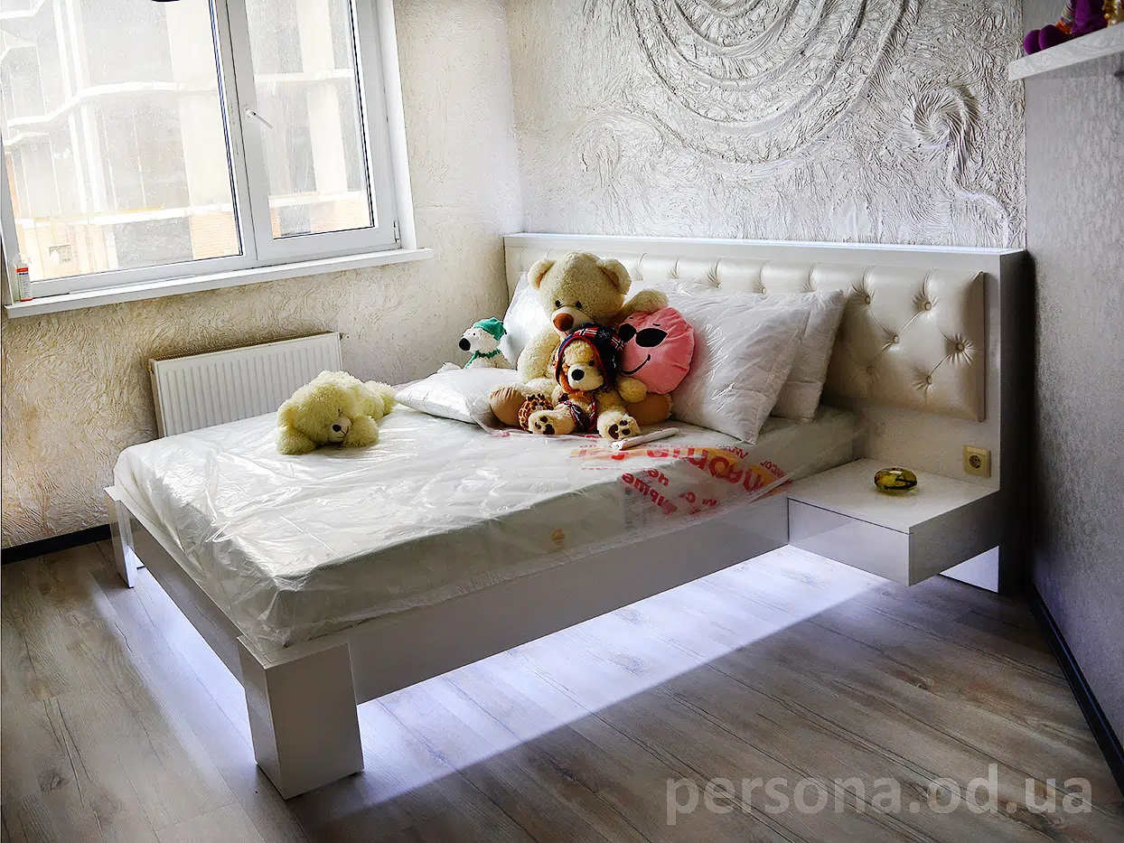 Bedroom with a photo print on the wardrobe