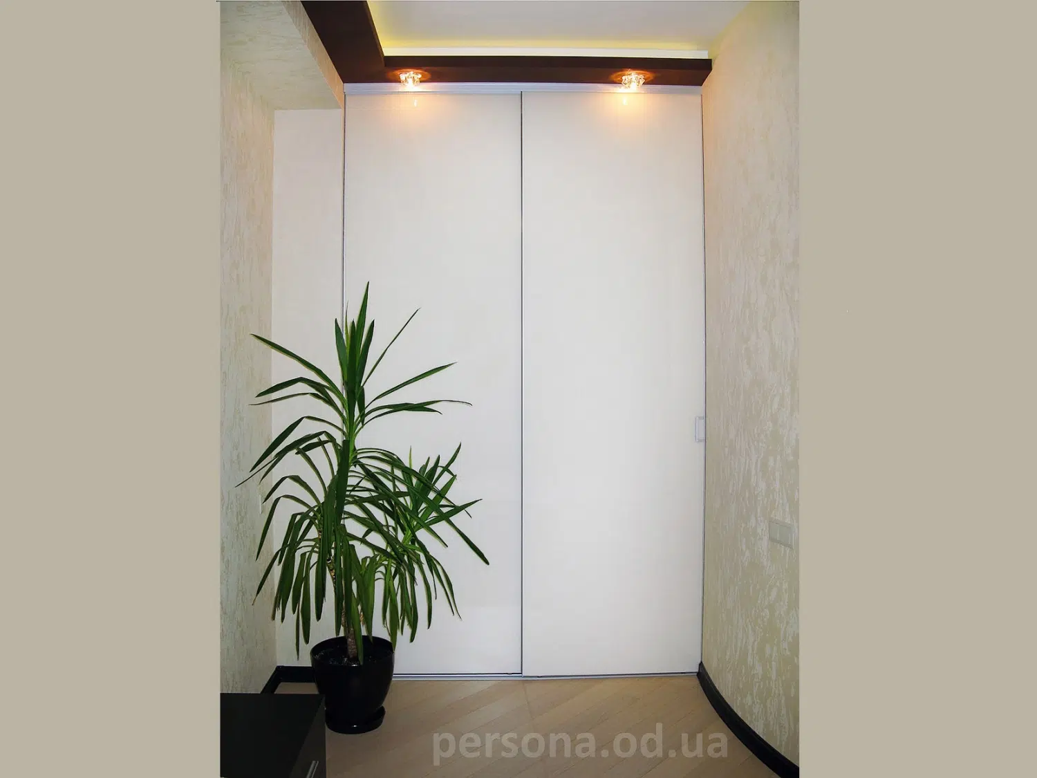 Sliding wardrobe with glass doors