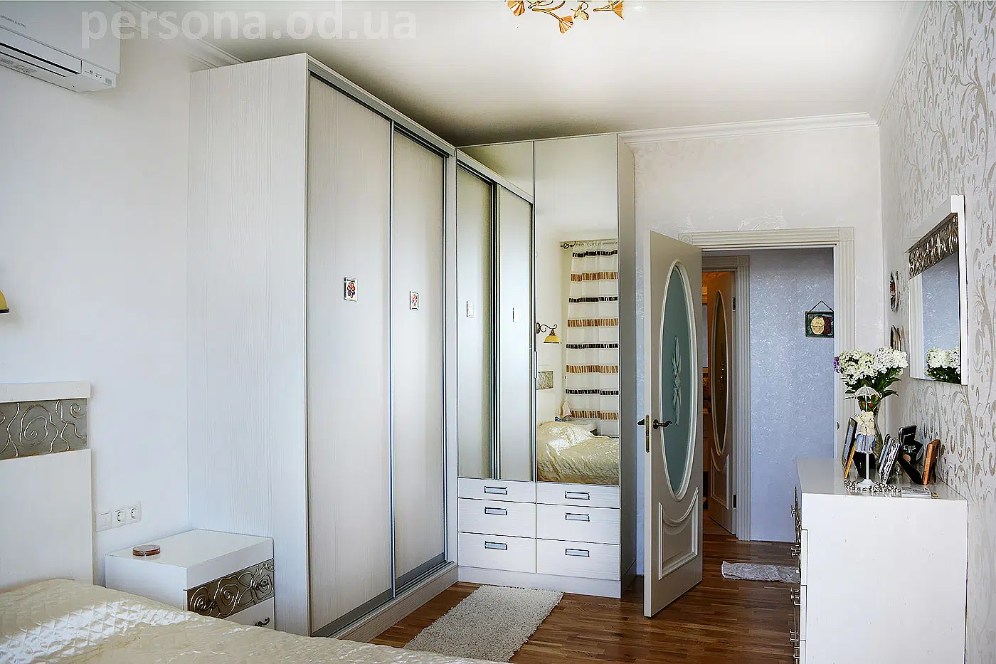 Corner wardrobe in a bedroom
