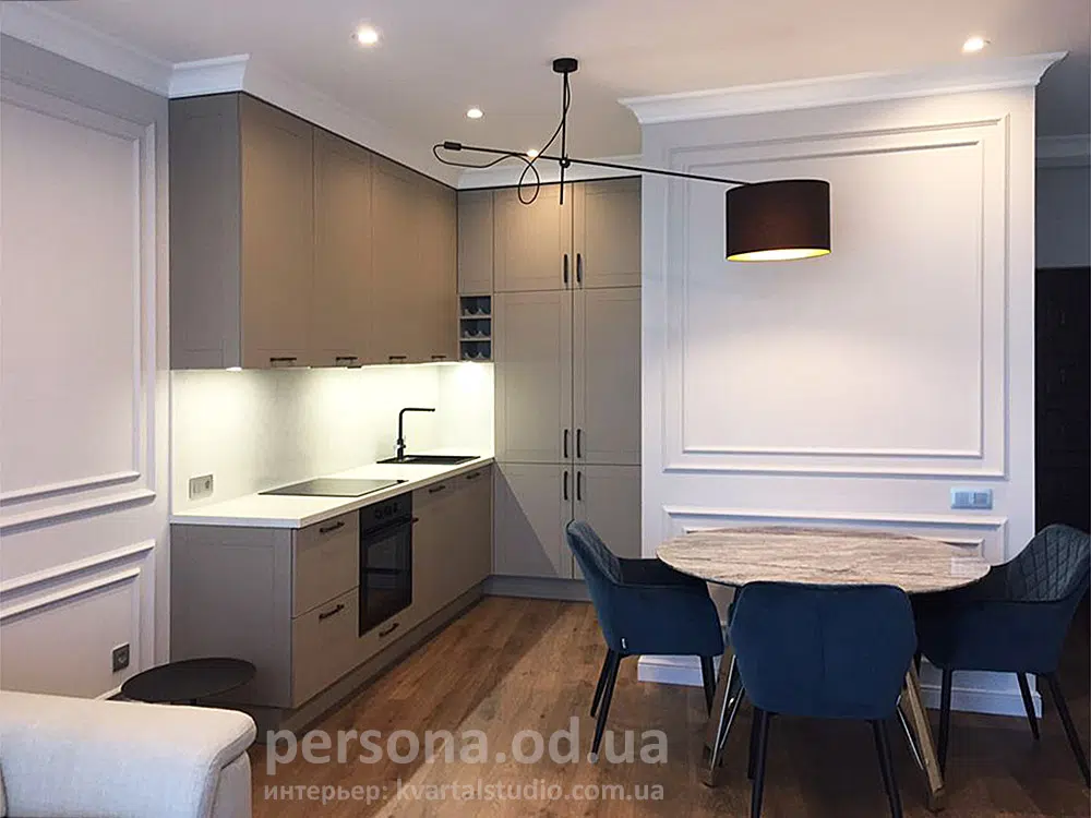 Corner kitchen with a built-in fridge